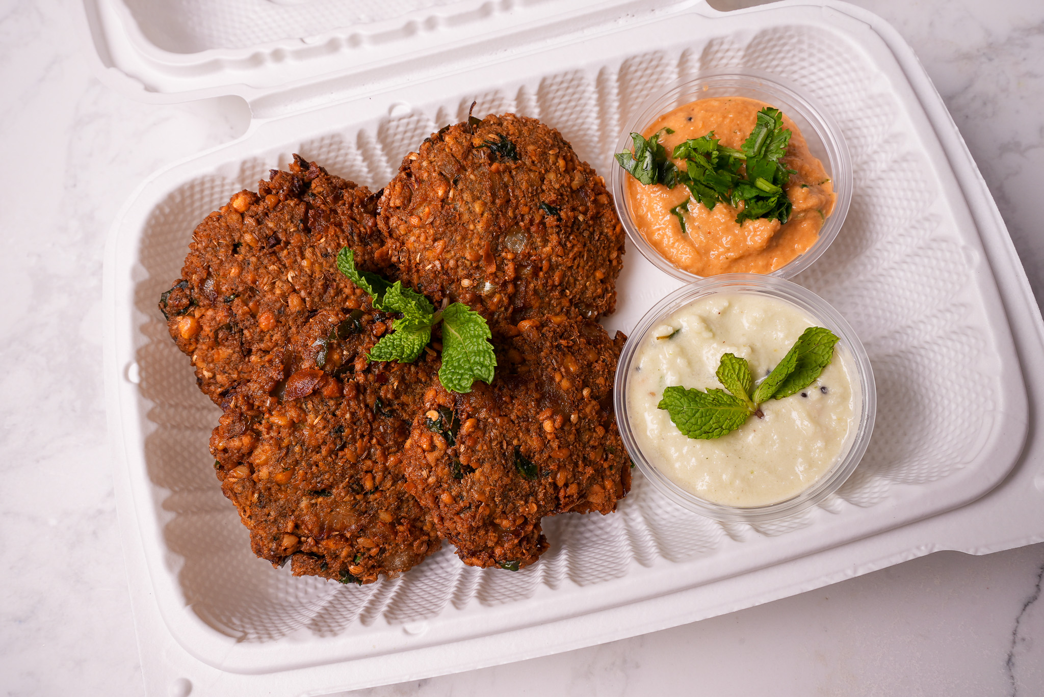image of Dal Vada with Tomato and Coconut Chutney
